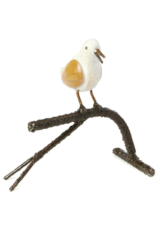 Single Songbird on Branch Stone and Metal Sculpture