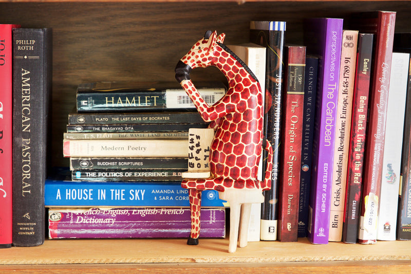 Sitting Giraffe Reader Sculpture