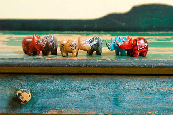 One Dozen Miniature Soapstone Rhinos