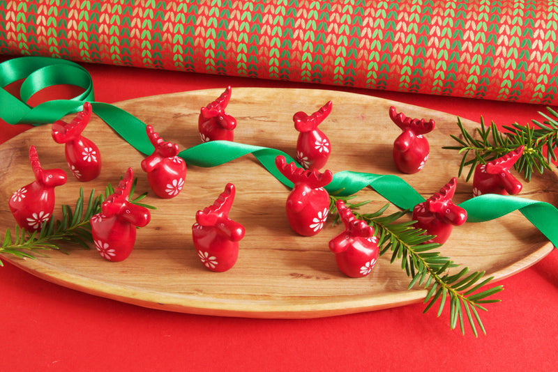 One Dozen Miniature Red Soapstone Reindeer