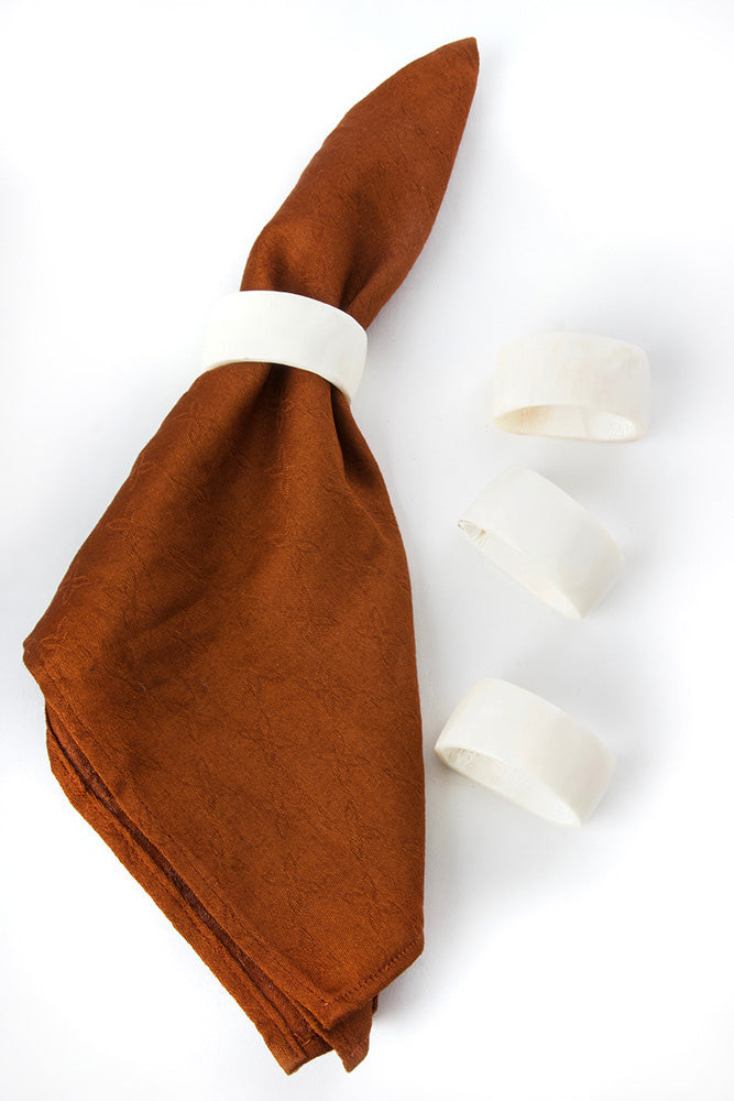 Set Of Four White Bone Napkin Rings